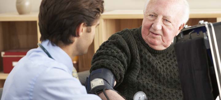 patient having blood pressure taken